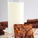 Peanut butter swirl brownies with a glass of milk