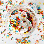 dairy-free vanilla ice cream with rainbow sprinkles