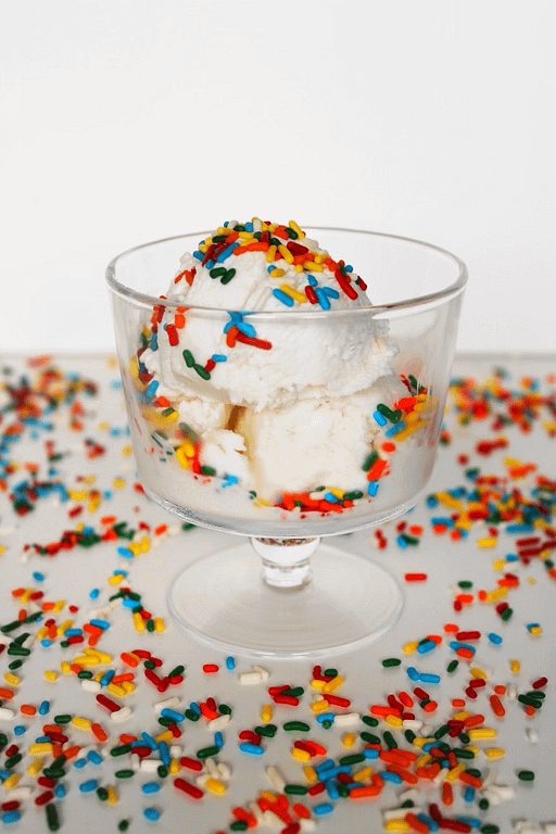 dairy-free vanilla ice cream with rainbow sprinkles